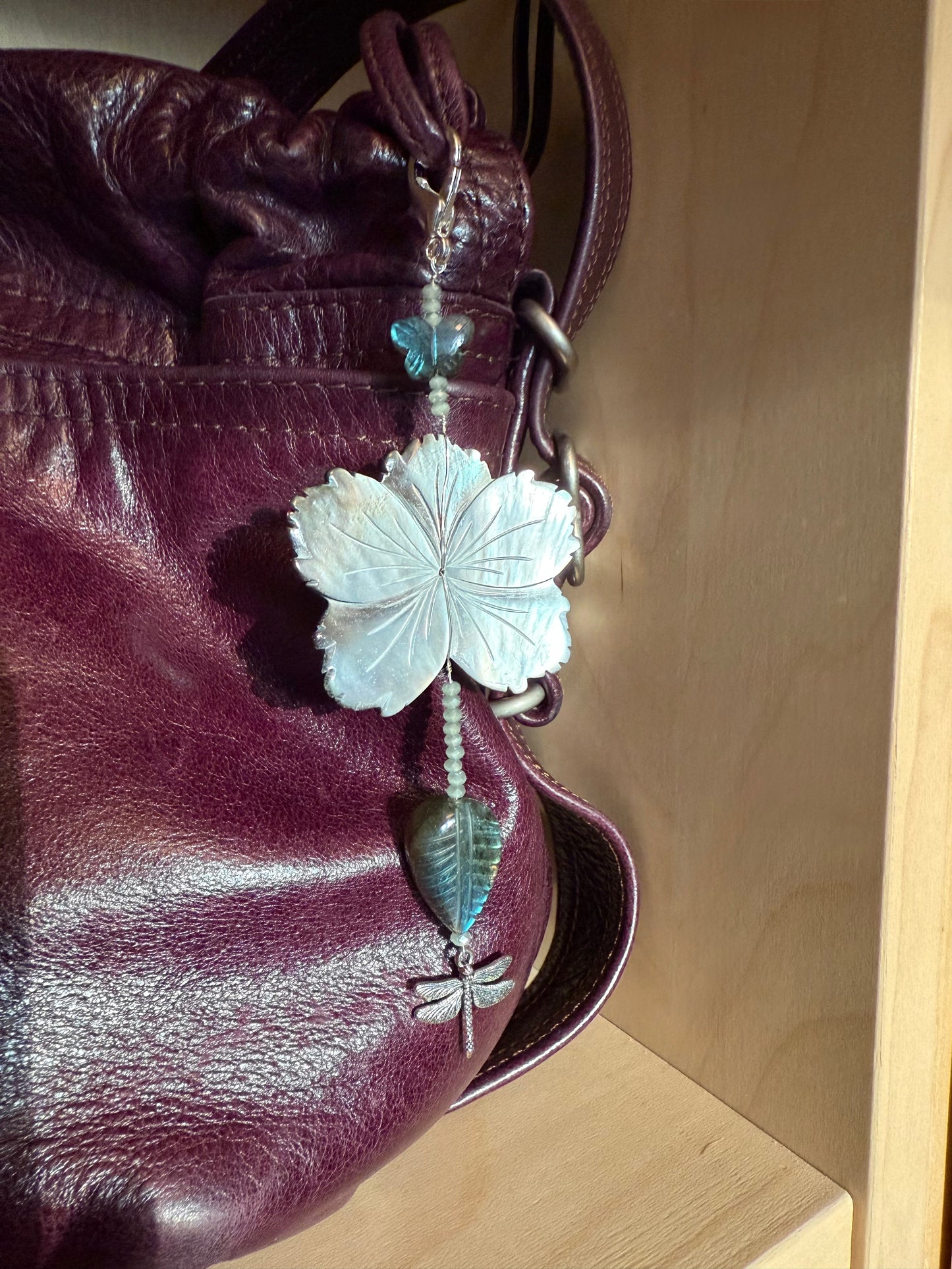 Time slows in the mystic garden, a meditative purse charm